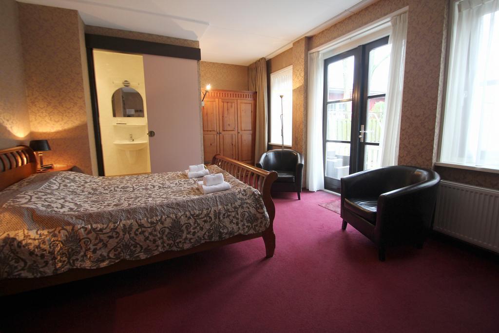 Amsterdam Village Hotel ภายนอก รูปภาพ