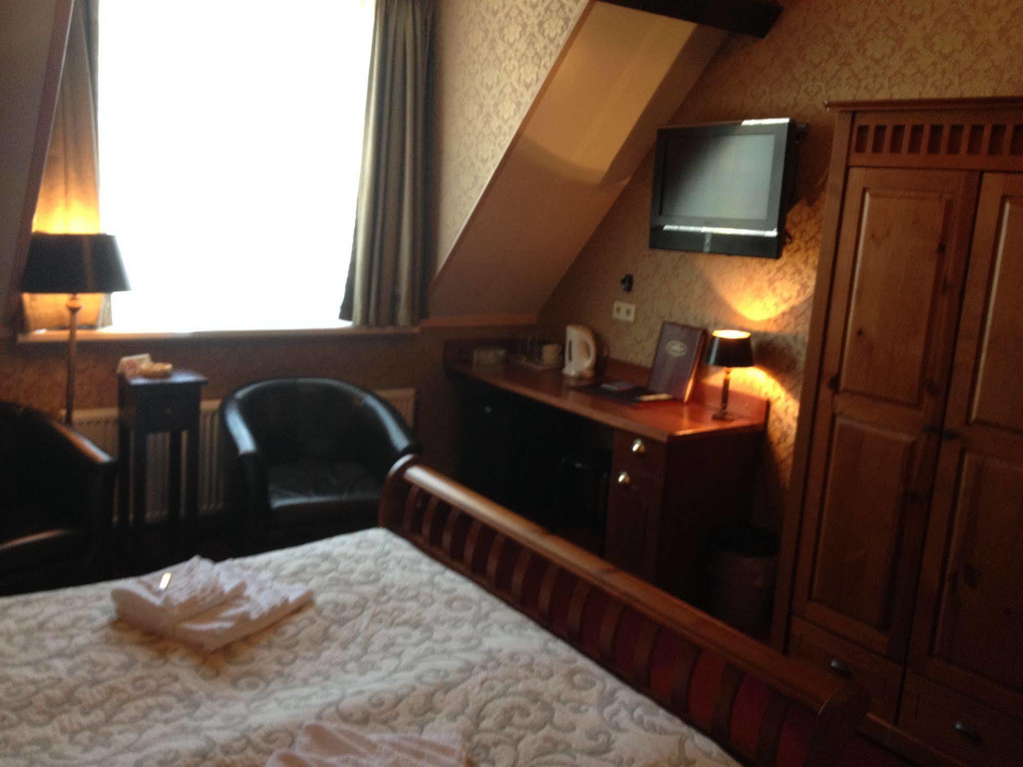 Amsterdam Village Hotel ภายนอก รูปภาพ